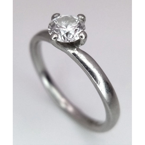 274 - A 950 Platinum Diamond Solitaire Ring. A 0.47ct VS1 brilliant round cut diamond. D colour. Size L. 3... 