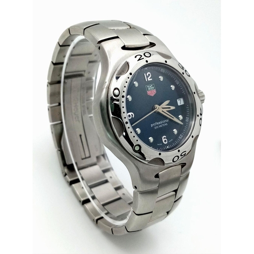 355 - A Tag Heuer Professional Quartz Gents Watch. Stainless steel bracelet and case - 37mm. Blue dial wit... 