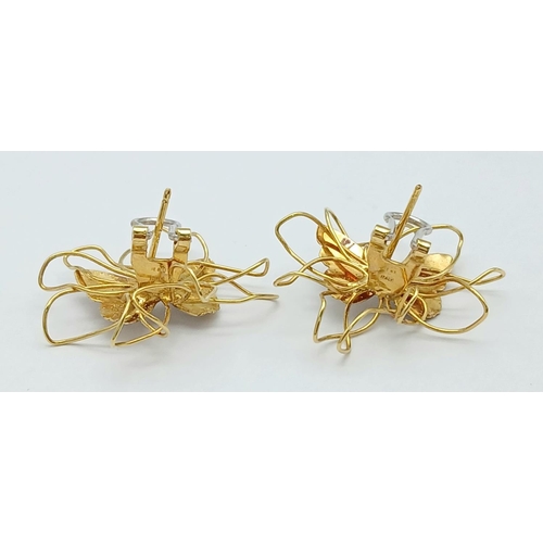 37 - A Pair of Stylish Italian 18K White and Yellow Gold Earrings. Butterfly form. 3cm x 3cm. 5.7g total ... 