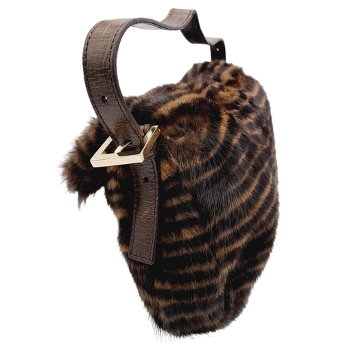 410 - A Fendi Brown Striped Fur Baguette Shoulder Bag. Faux fur exterior with magnetic closure and leather... 