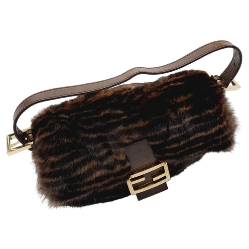 410 - A Fendi Brown Striped Fur Baguette Shoulder Bag. Faux fur exterior with magnetic closure and leather... 