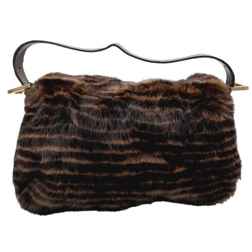 410 - A Fendi Brown Striped Fur Baguette Shoulder Bag. Faux fur exterior with magnetic closure and leather... 