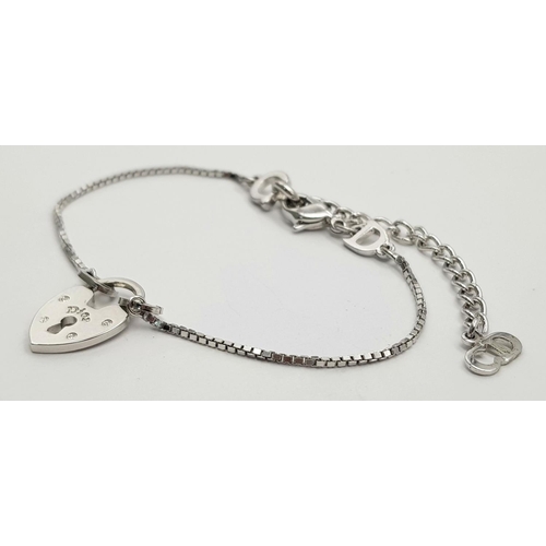 417 - A Dior Heart Padlock Necklace and Bracelet Set. 20cm and 41.5cm. Both come with boxes each. Ref:  18... 