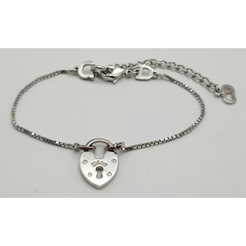 417 - A Dior Heart Padlock Necklace and Bracelet Set. 20cm and 41.5cm. Both come with boxes each. Ref:  18... 