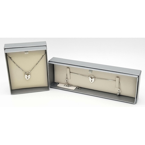 417 - A Dior Heart Padlock Necklace and Bracelet Set. 20cm and 41.5cm. Both come with boxes each. Ref:  18... 