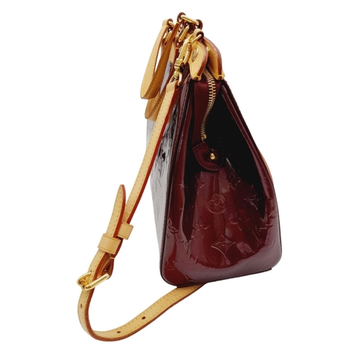 424 - A Louis Vuitton Burgundy Vernis Brea MM Bag. Monogram patent leather exterior with gold-toned hardwa... 