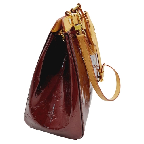 424 - A Louis Vuitton Burgundy Vernis Brea MM Bag. Monogram patent leather exterior with gold-toned hardwa... 