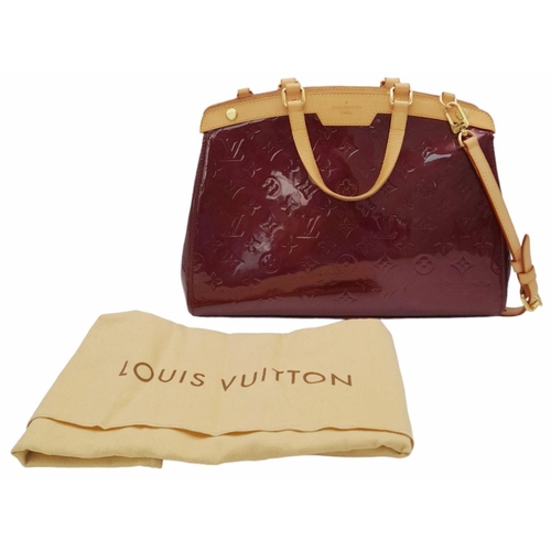 424 - A Louis Vuitton Burgundy Vernis Brea MM Bag. Monogram patent leather exterior with gold-toned hardwa... 