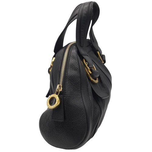 431 - A Bvlgari Black Polly Handbag. Black leather exterior with gold-toned hardware with two leather stra... 