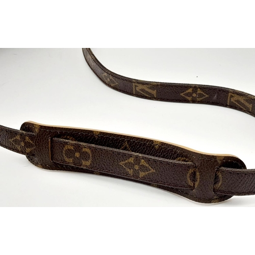 459 - A Louis Vuitton Removeable Strap. Coated Canvas with gold-toned hardware and shoulder grip. In good ... 