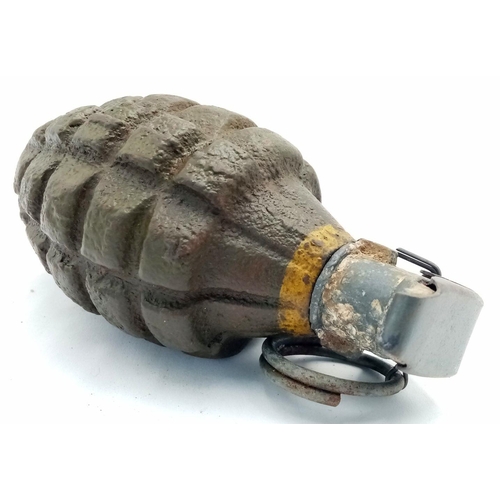 575 - INERT WW2 US Pineapple Hand Grenade. Found in the Ardennes Forest. The lever has been replaced.
UK m... 