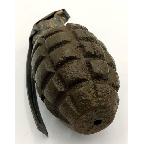 575 - INERT WW2 US Pineapple Hand Grenade. Found in the Ardennes Forest. The lever has been replaced.
UK m... 