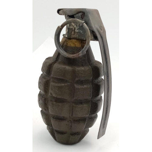 575 - INERT WW2 US Pineapple Hand Grenade. Found in the Ardennes Forest. The lever has been replaced.
UK m... 