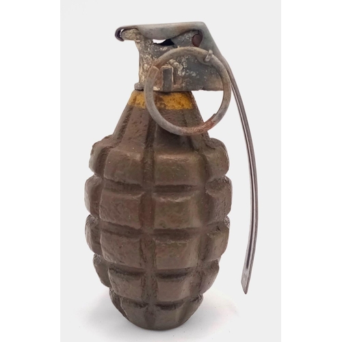 575 - INERT WW2 US Pineapple Hand Grenade. Found in the Ardennes Forest. The lever has been replaced.
UK m... 