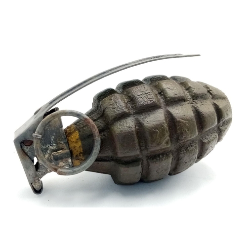 575 - INERT WW2 US Pineapple Hand Grenade. Found in the Ardennes Forest. The lever has been replaced.
UK m... 