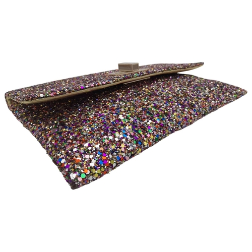 213 - An Anya Hindmarch Multicolour New Valorie Clutch Bag. Leather and glitter exterior with rose gold-to... 