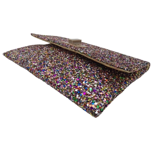 213 - An Anya Hindmarch Multicolour New Valorie Clutch Bag. Leather and glitter exterior with rose gold-to... 