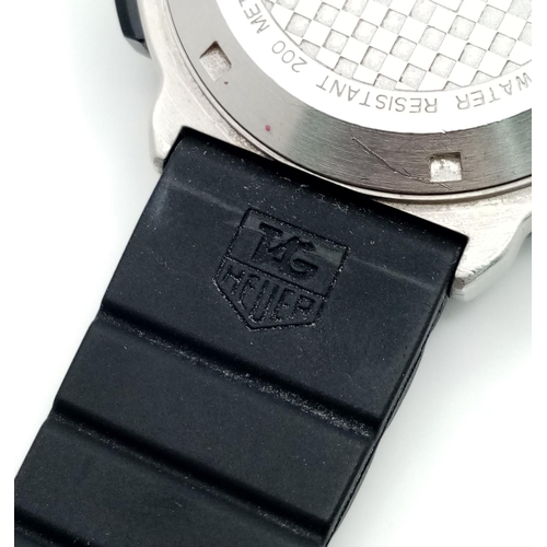 23 - A TAG-HEUER 