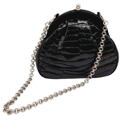 249 - A Prada Black Coccodrillo Evening Bag. Crocodile leather exterior with silver-toned hardware, textil... 