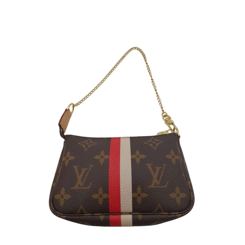 361 - A Louis Vuitton My LV Heritage Mini Pochette Accessories. Monogram coated canvas exterior with gold-... 