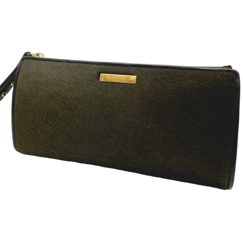 382 - A Burberry Moss Green Purse/Clutch Bag. Pony hair and leather trim exterior with gold-toned hardware... 