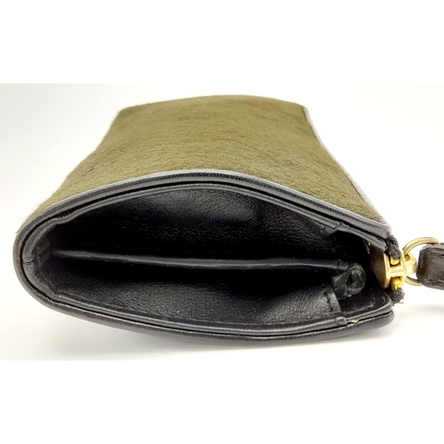 382 - A Burberry Moss Green Purse/Clutch Bag. Pony hair and leather trim exterior with gold-toned hardware... 