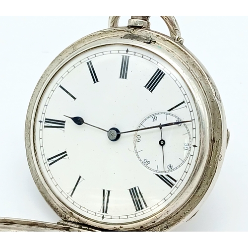 400 - A Silver Half Hunter Pocket Watch. Hallmarks. In working order but because of age no guarantees. 94g... 