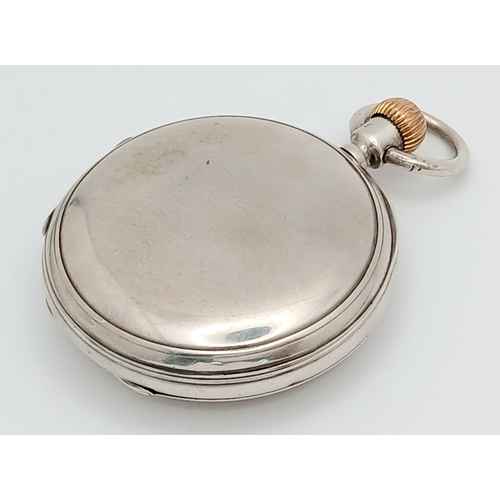 400 - A Silver Half Hunter Pocket Watch. Hallmarks. In working order but because of age no guarantees. 94g... 