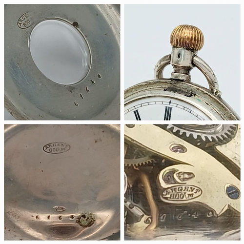 400 - A Silver Half Hunter Pocket Watch. Hallmarks. In working order but because of age no guarantees. 94g... 