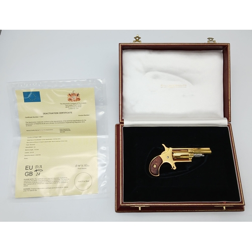 43 - A North American Gold Plated Miniature Deactivated .22 Calibre Revolver. 12cm total length. Fitted c... 