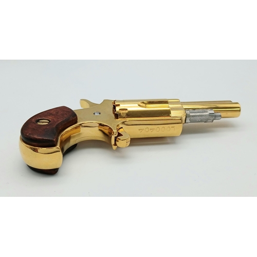 43 - A North American Gold Plated Miniature Deactivated .22 Calibre Revolver. 12cm total length. Fitted c... 