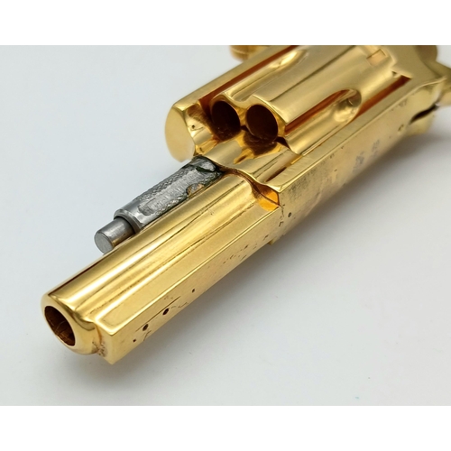 43 - A North American Gold Plated Miniature Deactivated .22 Calibre Revolver. 12cm total length. Fitted c... 