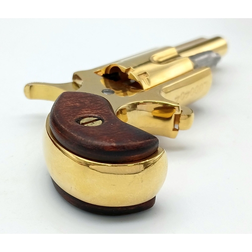 43 - A North American Gold Plated Miniature Deactivated .22 Calibre Revolver. 12cm total length. Fitted c... 