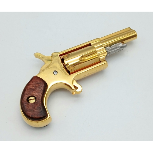 43 - A North American Gold Plated Miniature Deactivated .22 Calibre Revolver. 12cm total length. Fitted c... 