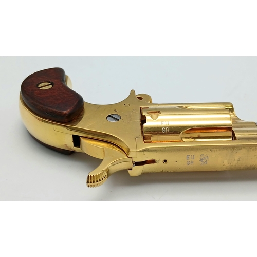 43 - A North American Gold Plated Miniature Deactivated .22 Calibre Revolver. 12cm total length. Fitted c... 