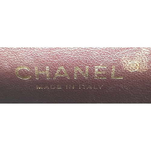 101 - A Chanel Black Classic Double Flap Bag. Quilted leather exterior with gold-toned hardware, chain and... 