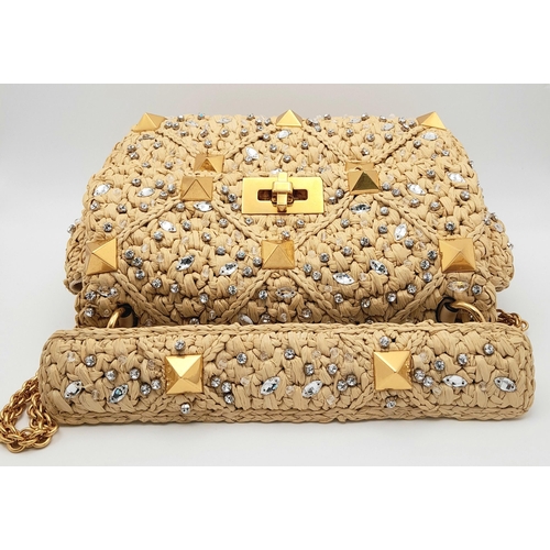 206 - A Valentino Beige Roman Bag. Woven raffia, crystal and stud embellished exterior with gold-toned har... 