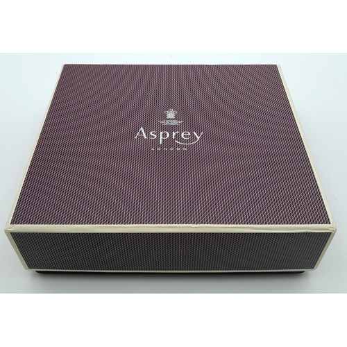 241 - An Asprey Black Coin Purse. Crocodile leather exterior with silver-toned hardware and zip top closur... 