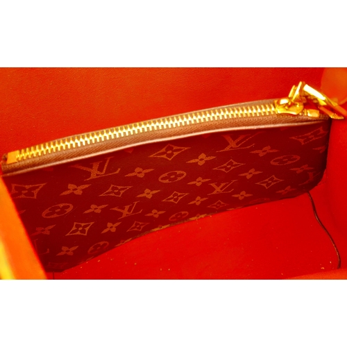 277 - A Louis Vuitton Neonoe Shoulder Bag. Monogram coated canvas exterior with gold-toned hardware, remov... 