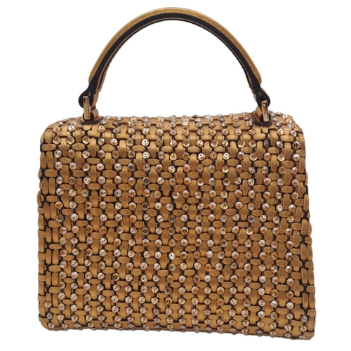 298 - A Valentino Gold Mini VSLING Bag. Woven leather and stone embellished exterior with gold-toned hardw... 