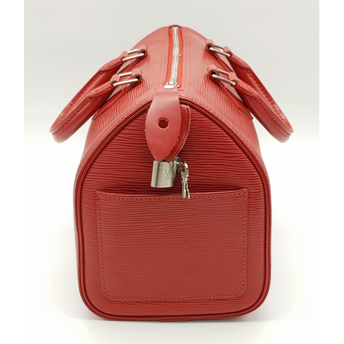 319 - A Louis Vuitton Red Speedy Bag. Epi leather exterior with silver-toned hardware, two rolled leather ... 