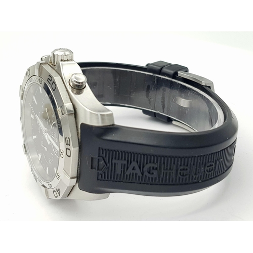 394 - A Tag Heuer Aquaracer Chronograph Quartz Gents Watch. Model - CAF 101E. Black rubber strap. Stainles... 