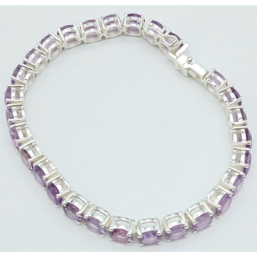 127 - An Amethyst Gemstone Tennis Bracelet set in 925 Silver. 18cm. 19g. CD-1368