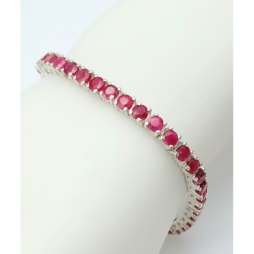 134 - A Ruby Gemstone Tennis Bracelet set in 925 Silver. 17cm. 17g. CD-1370