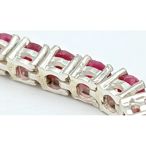 134 - A Ruby Gemstone Tennis Bracelet set in 925 Silver. 17cm. 17g. CD-1370