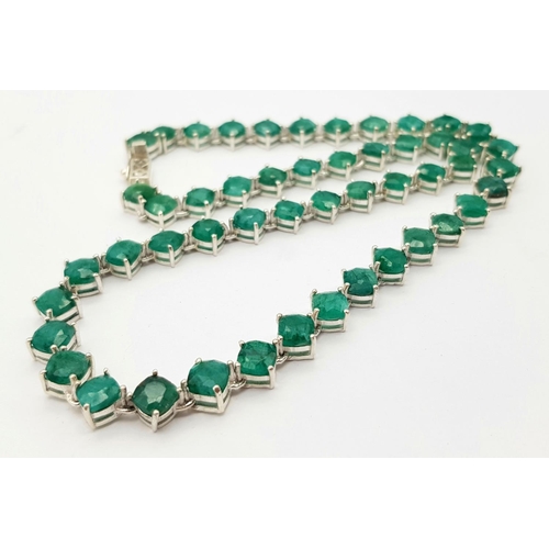 17 - An Emerald Gemstone Tennis Necklace set in 925 Silver. 44cm. 35.5g. CD-1375