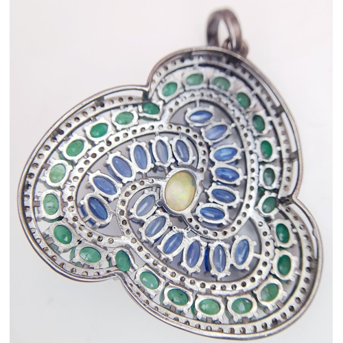 190 - An Opal, Emerald, Kyanite and Diamond Decorative Swirl Pendant - Emerald weight 5.3ctw, Kyanite 5.6c... 