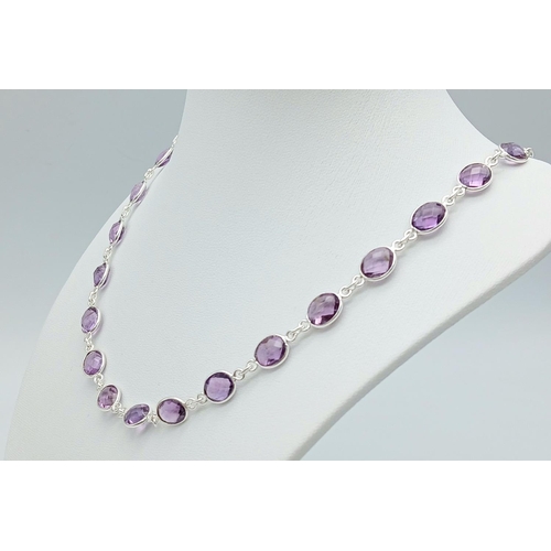 261 - An Amethyst Gemstone Chain Necklace set in 925 Silver. Oval cut. 48cm. 19g. CD-1372