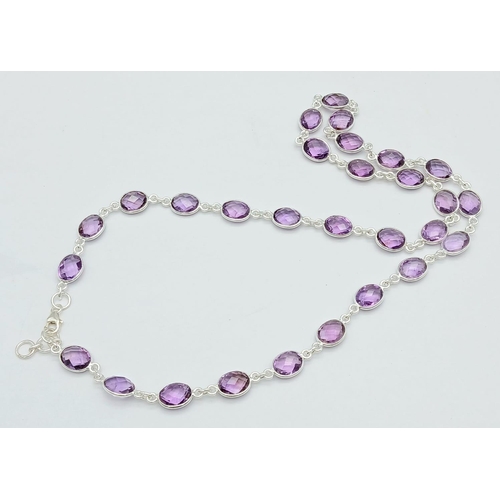 261 - An Amethyst Gemstone Chain Necklace set in 925 Silver. Oval cut. 48cm. 19g. CD-1372