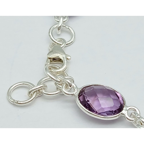 261 - An Amethyst Gemstone Chain Necklace set in 925 Silver. Oval cut. 48cm. 19g. CD-1372